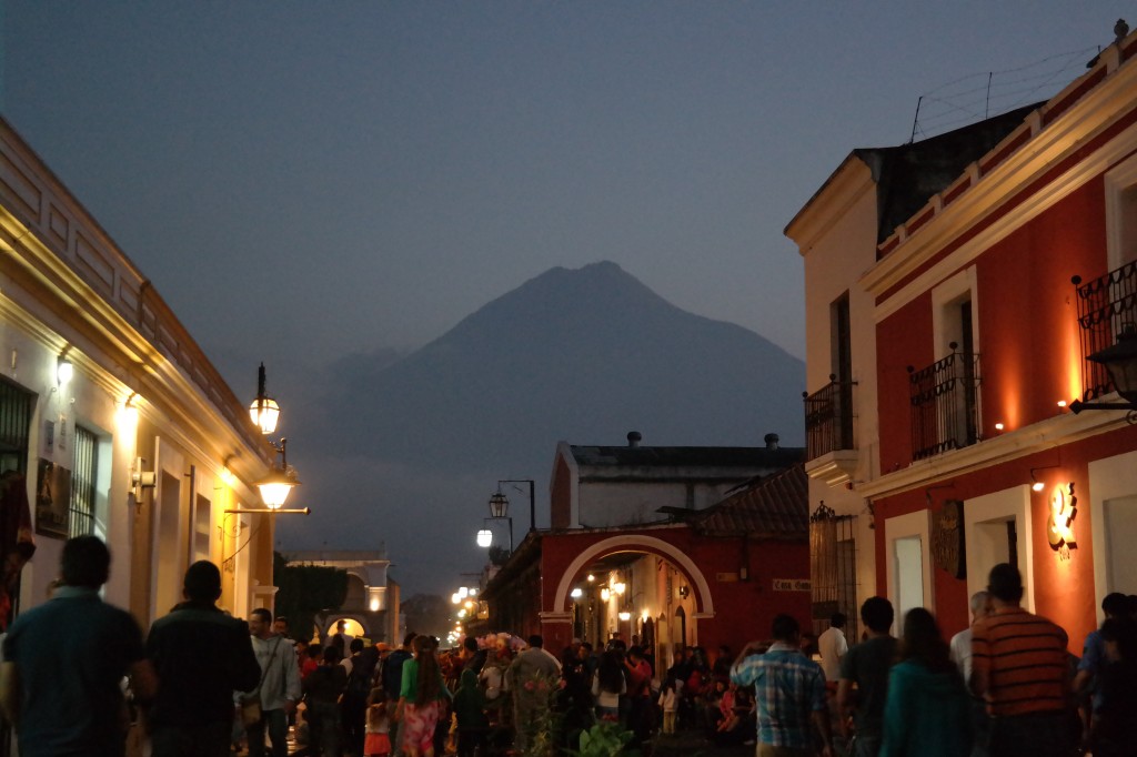 Volcan Agua looms above town in the smoky, cloudy sky
